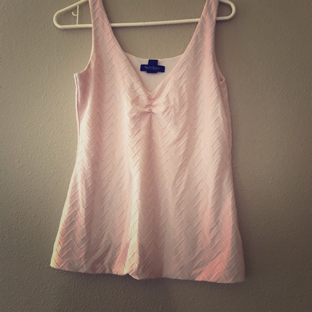 Pink tank top blouse.